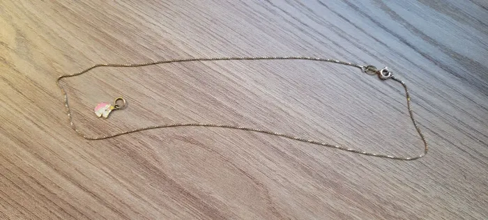 Colar infantil dourado com pingente de unicórnio 