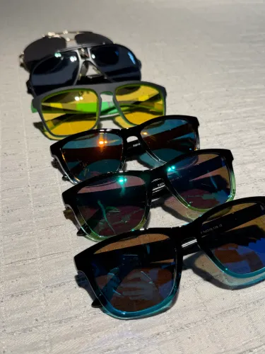 Lote 6 óculos de sol novos: 3 Hawkers, 2 Triton e 1 Polarized