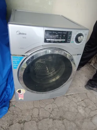 Máquina lava e seca com defeito