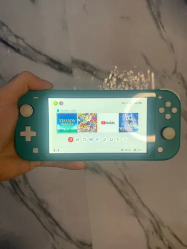 Videogame Nintendo Switch Lite Seminovo + Cartão SD 2 GB + Jogos