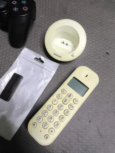 Telefone sem fio e vídeo game portátil