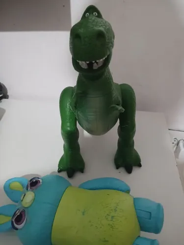 Lote toy story rex com avarias PERNA QUEBRADA