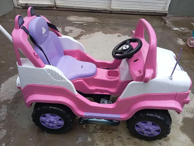 Carrinho de passeio e pedal empurrador calesita diipi rosa usado