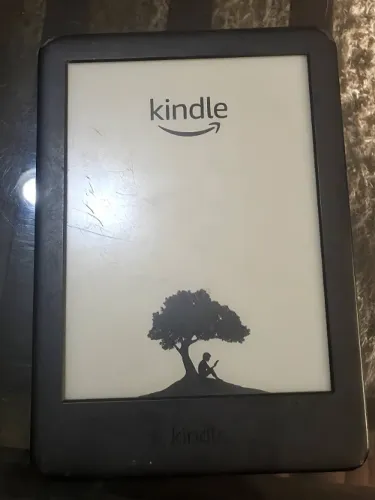 Kindle - COM DEFEITO (Não Liga) / porém a tela está inteira, sem quebras.