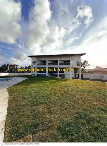 Mansão na beira da praia, 5 suítes com ar-condicionado, piscina, deck ,churrasqueira.