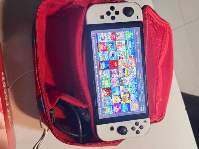 Nintendo switch desbloqueado oled semi novo mais case Mario 
