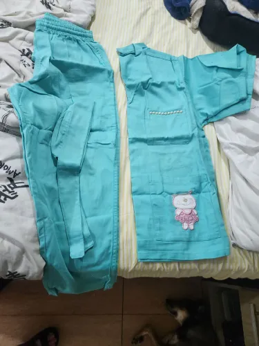 Roupas de auxiliar de veterinario