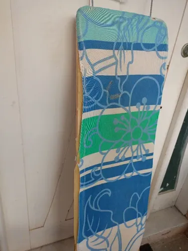 Tábua de passar roupa usada