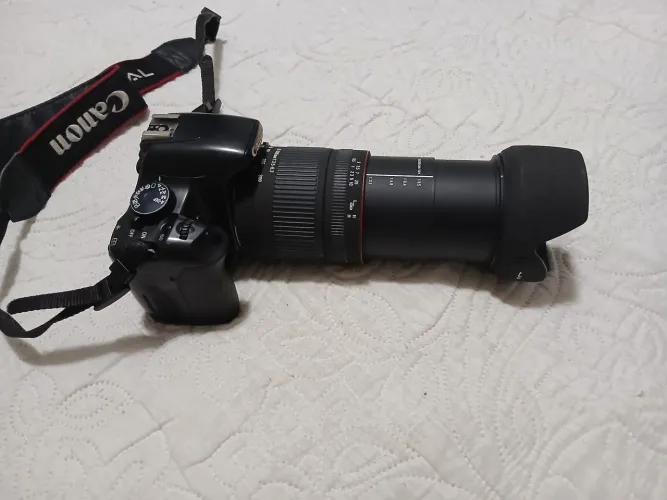 Vendo câmera usada cânon + lente sigma 28-300mm