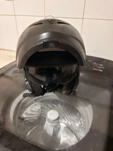 Capacete escamoteavel 