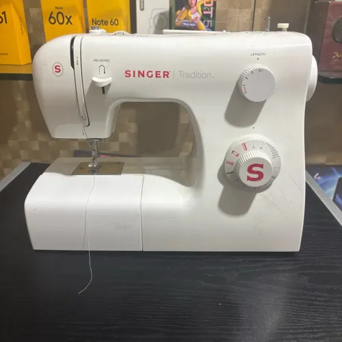 Máquina de costura singer