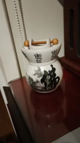Peça decorativa com foto de Buda