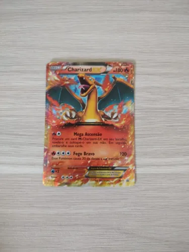 Carta de pokémon tcg "Charizard EX (XY17)" original e conservada.