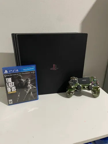 PS4 pró 1 terá - SEMI NOVO COMPLETO