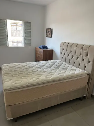 Vendo cama box muito nova