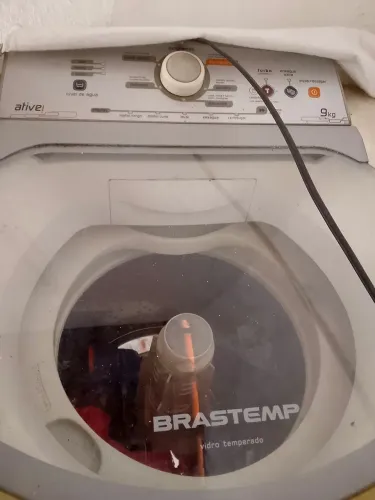 Máquina de lavar com defeito 