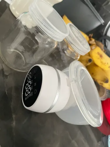 Bomba extratora de leite + 2 potes de armazenamento de vidro 