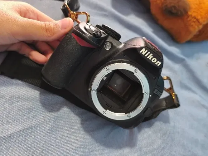 Nikon d3100 com duas lentes e bolsa de couro