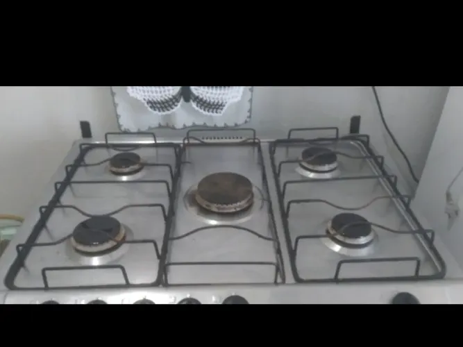Vendo este fogão com 5 bocas porta do forno espelhado