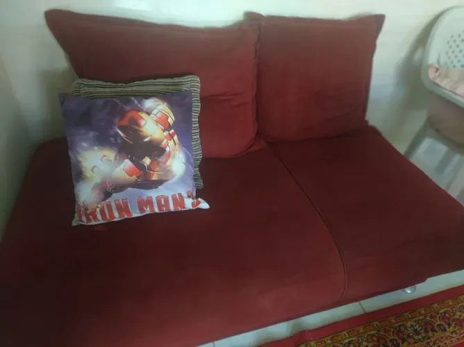 Vendo um sofá em perfeito estado de conservação