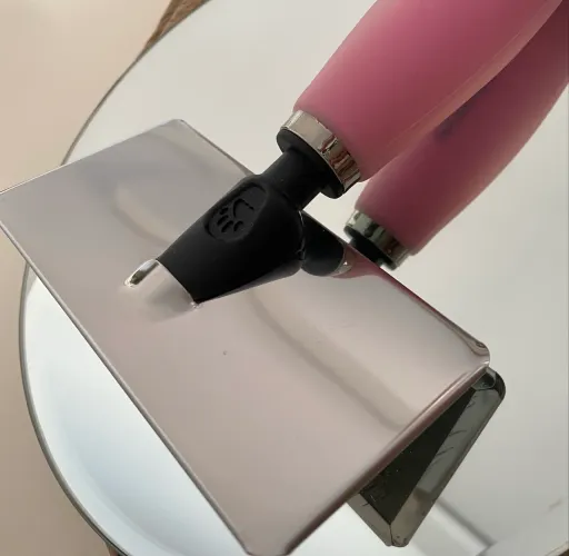 Escova rasqueadeira