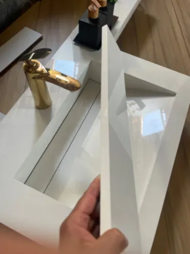 Lavatório esculpido em porcelanato