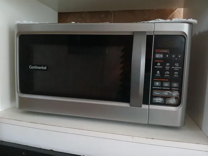 Vendo um micro-ondas continental cor inox 34 litros  