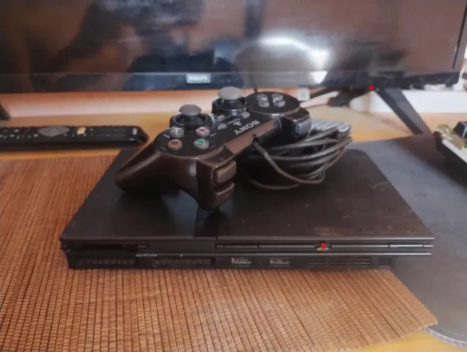 PS2 e controle original