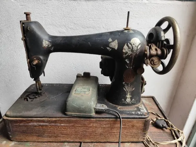 Máquina de costura antiga The Singerman FG