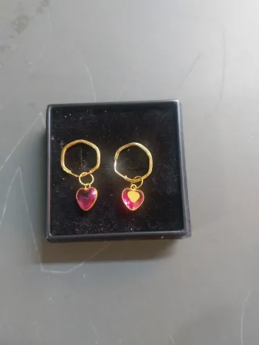 Vende_se uma argola de ouro 18 k tamanho p com pigente