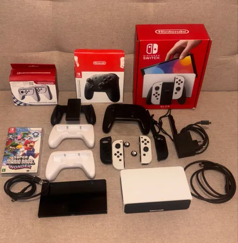 Videogame Nintendo Switch OLED + Mario Bros. Wonder + Controle Extra + Acessórios