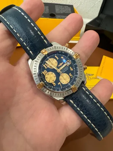 Breitling Chronomat Evolution aço e ouro 44mm Blue dial.
