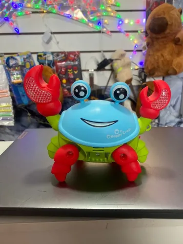 Brinquedo caranguejo que anda musical com led