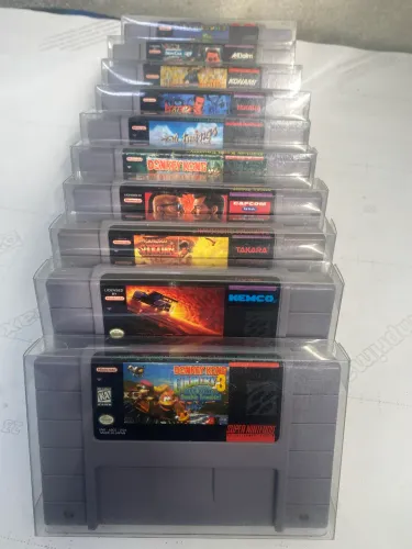 Lote com 10 jogos super Nintendo originais .