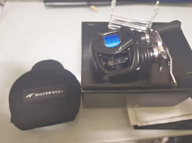 Carretilha Daiwa Silver Wolf CT XG Esq