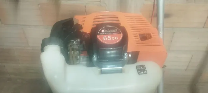 Vendo ou troco por motor elétrqico, motor 65 cc adaptado para caiaque. 
