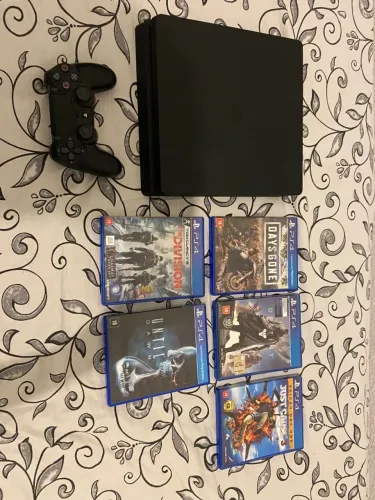 Playstation 4 com 1 Tera + jogos