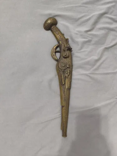 Objetivo decorativo de bronze