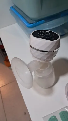 Extrator de leite materno + saco e pote de vidro para armazenar o leite