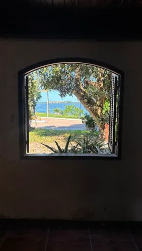 Vendo casa beira de lagoa