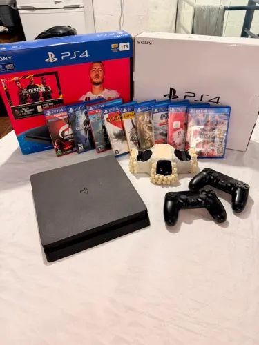 Play 4 slim, 1 tb, 9 jogos, 2 controles originais.