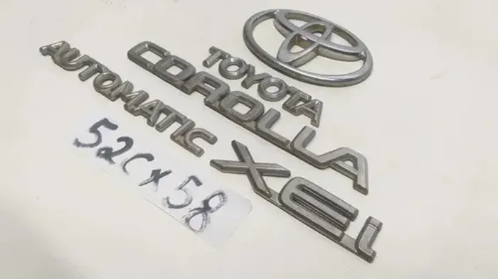 Emblema Letreiro Tampa Traseira Toyota Corolla 2010