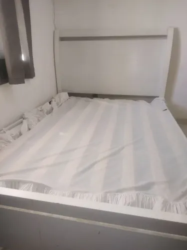 Cama de madeira