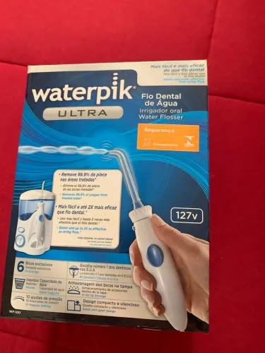 Fio dental de agua