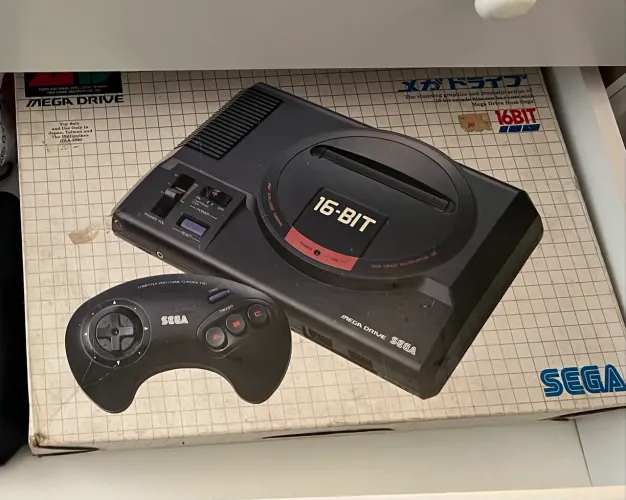 Mega drive com caixa