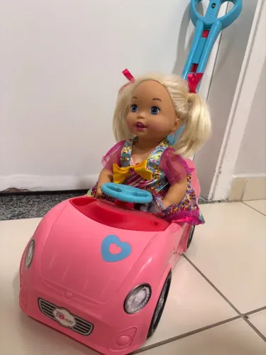 Boneca com carrinho 