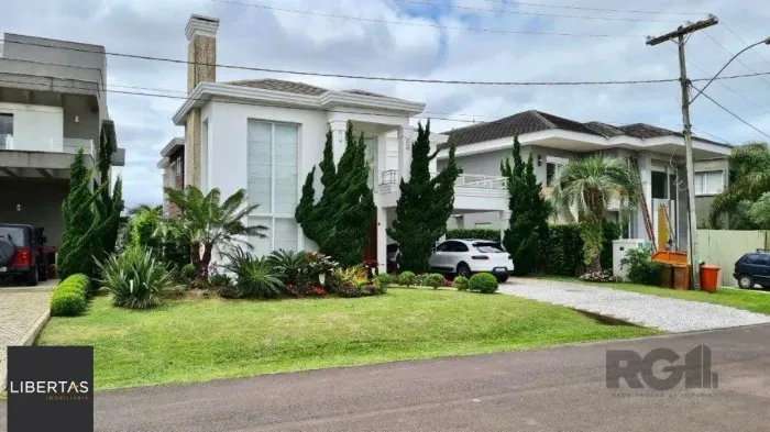 Casa de Condomínio em Atlântida