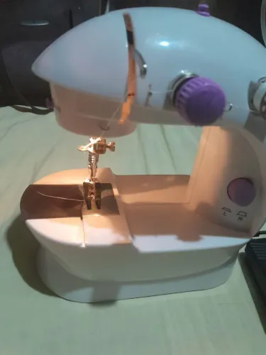 Máquina de costura elétrica