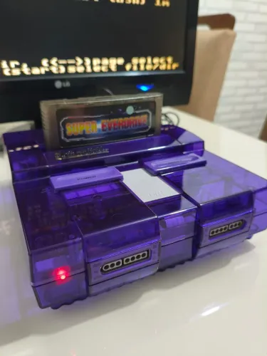 Nintendo SNES roxo com everdrive