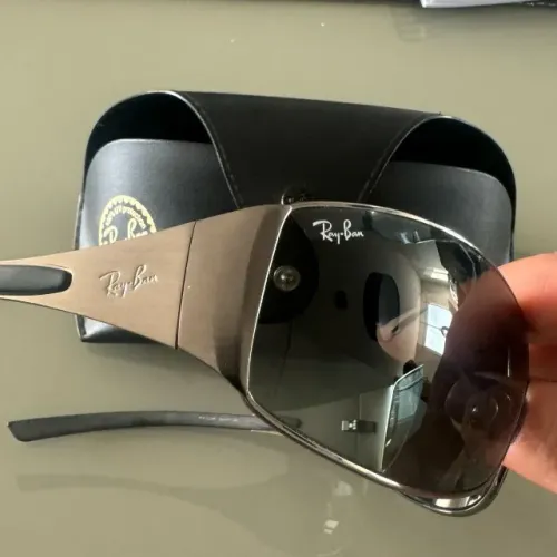 Óculos Ray-Ban RB3211 com armação prateada e lentes degradê